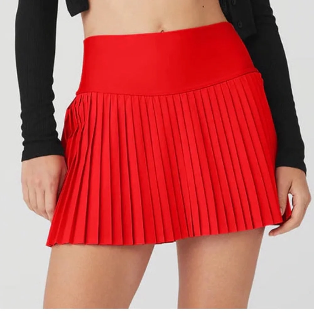 Red pleated also tennis skirt